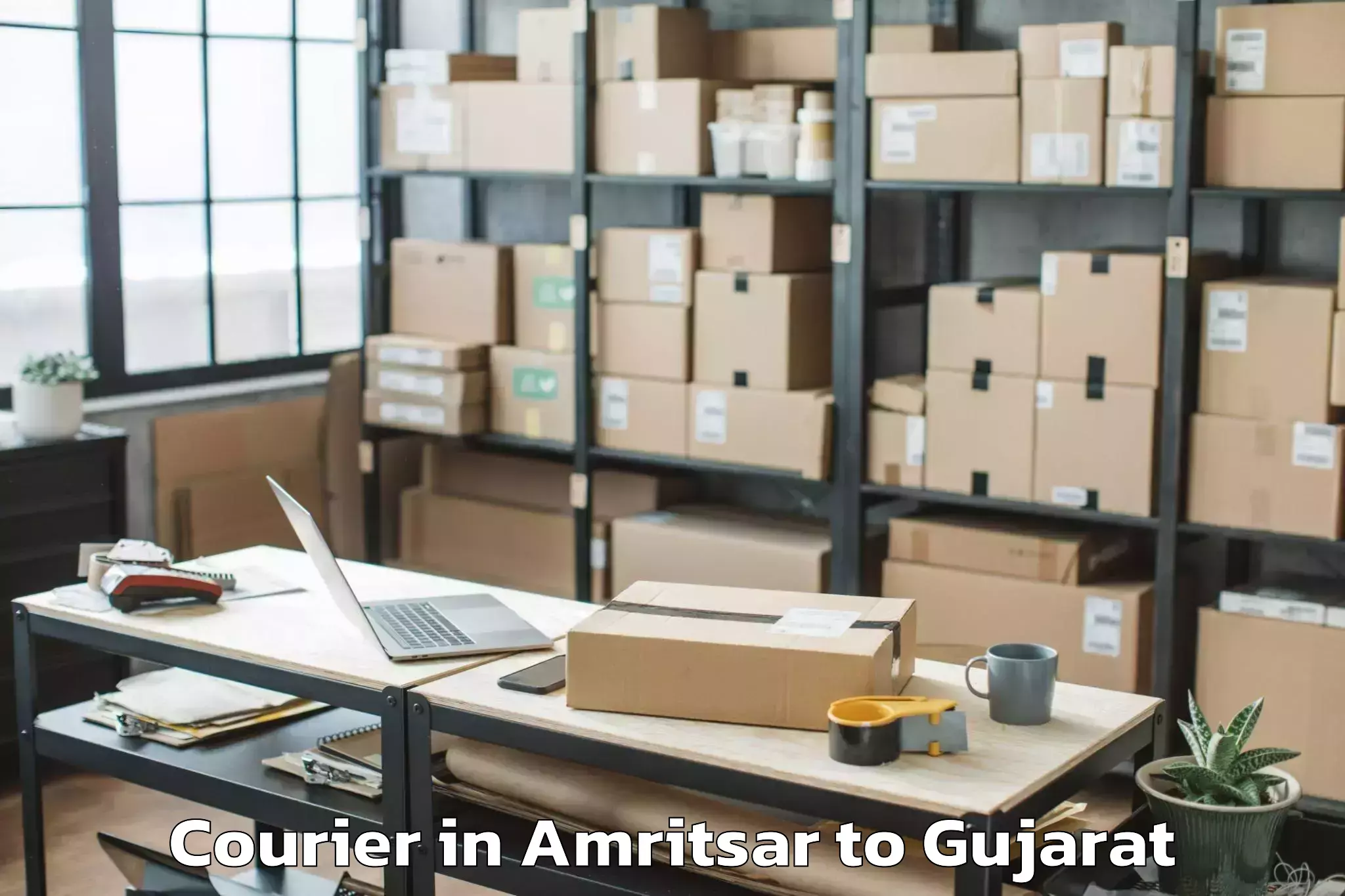 Reliable Amritsar to Deendayal Port Trust Courier